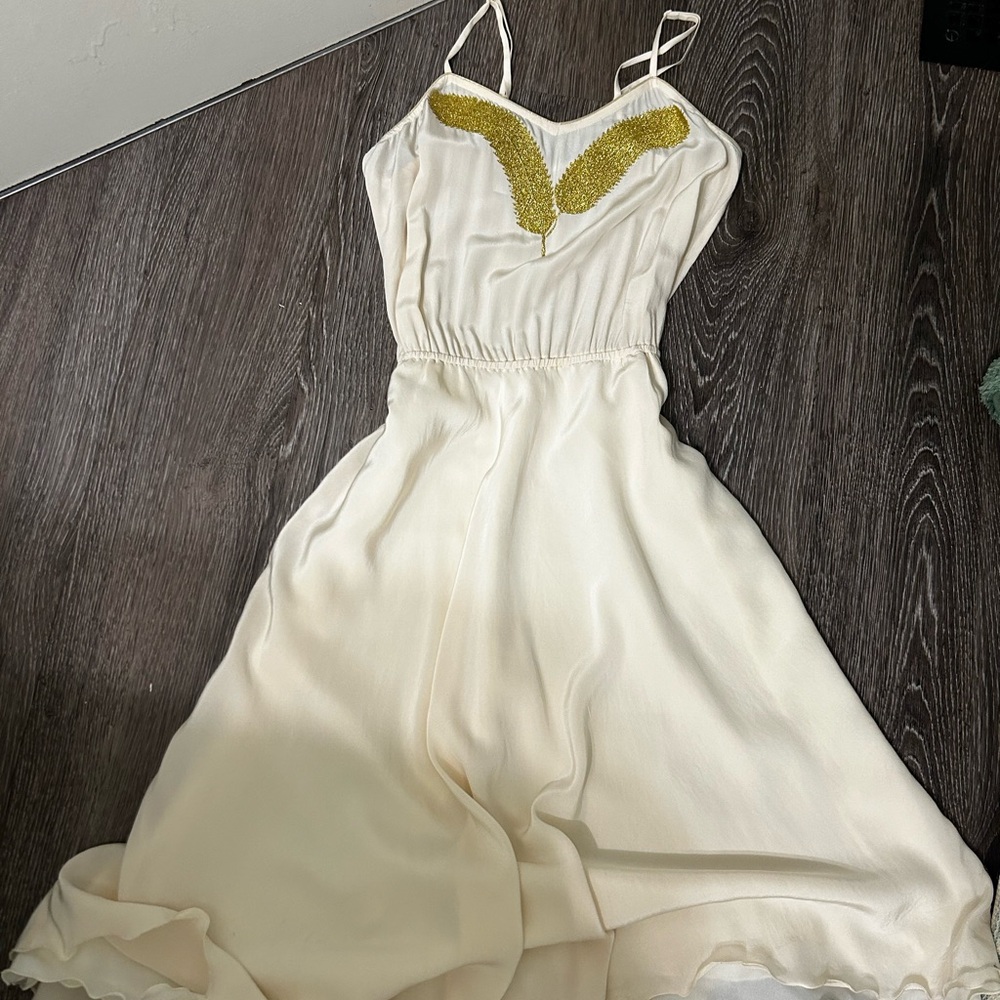 Elegant Cream Dress with Gold Accents